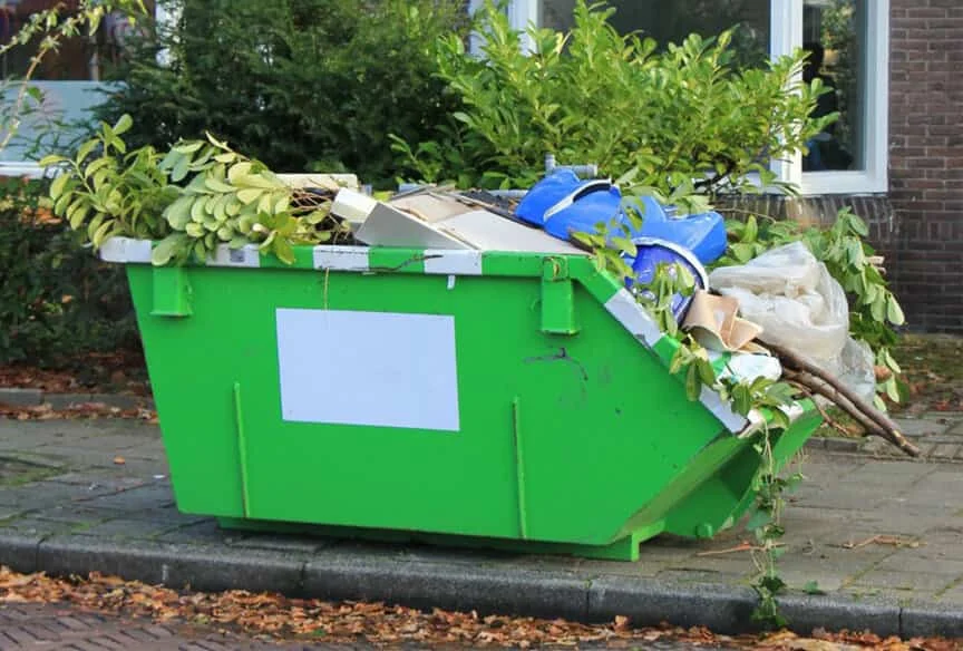 PP rubble chute carrying powder from a hopper outlet down into a bin on the factory floor